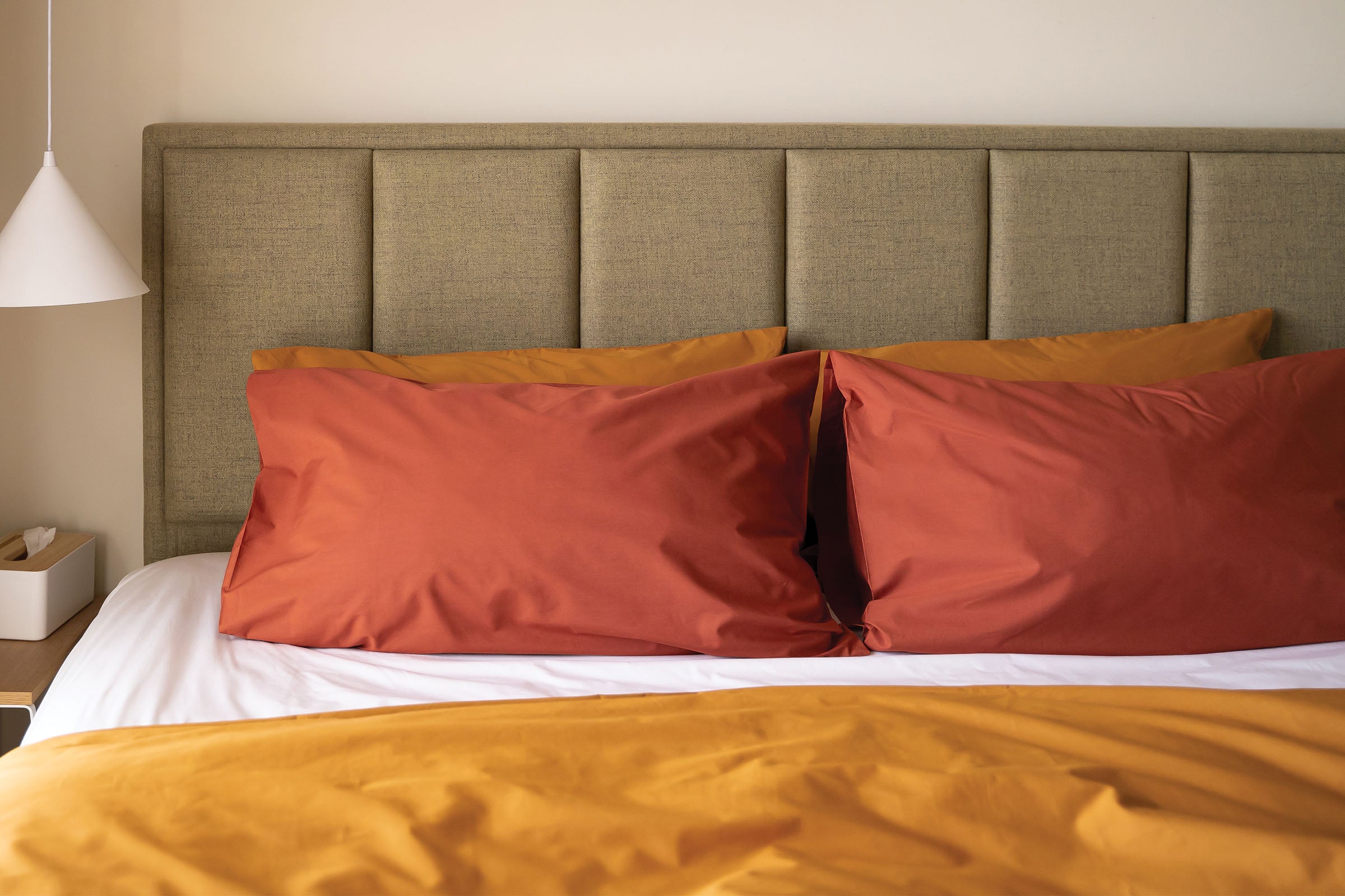 crisp-white-fitted-sheet-mustard-duvet-cover-pillowcase-pair-clay-pillowcase-pair-by-sojao.jpg