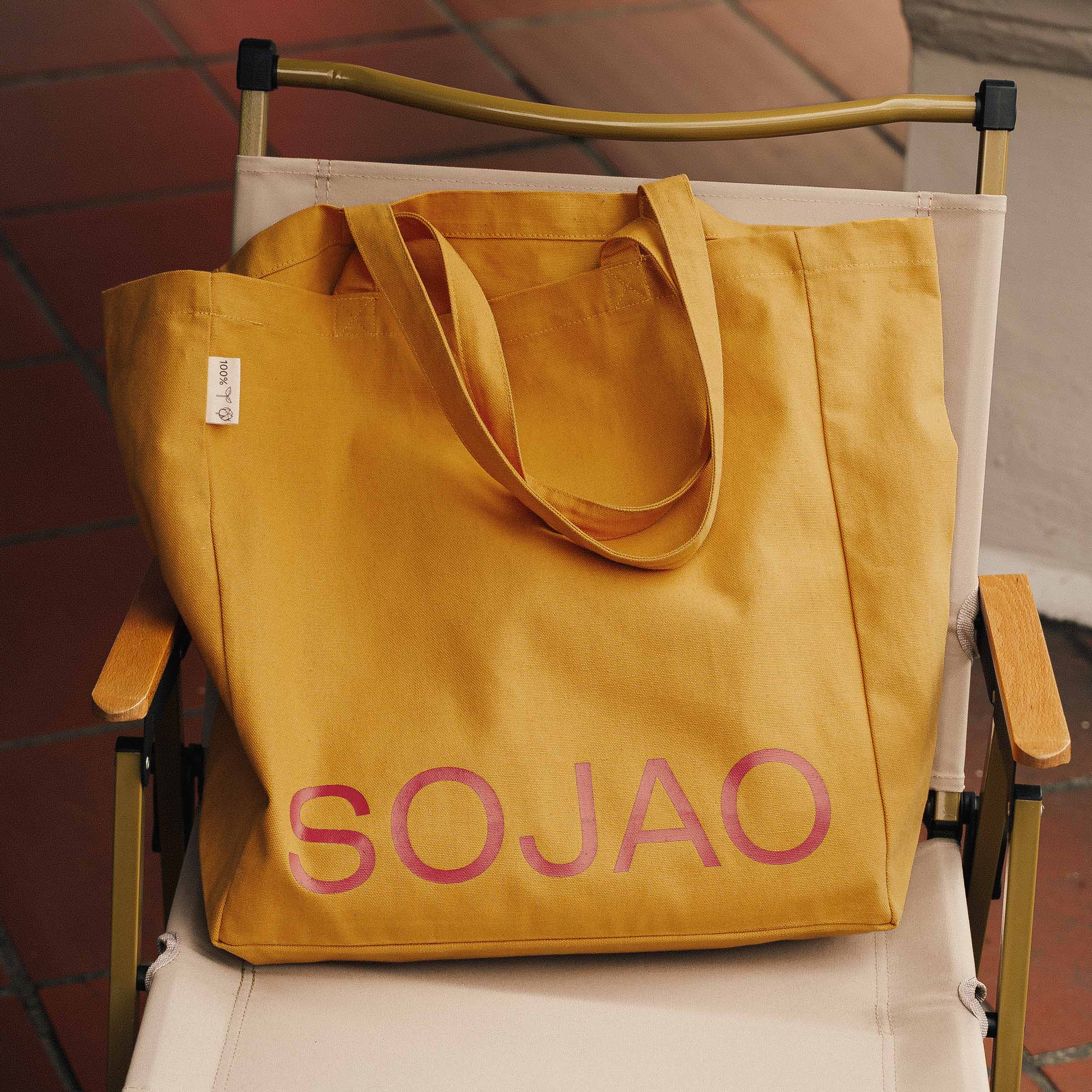 organic-cotton-SOJAO-tote-bag-in-cobalt-colour-on-a-camping-chair-by-sojao
