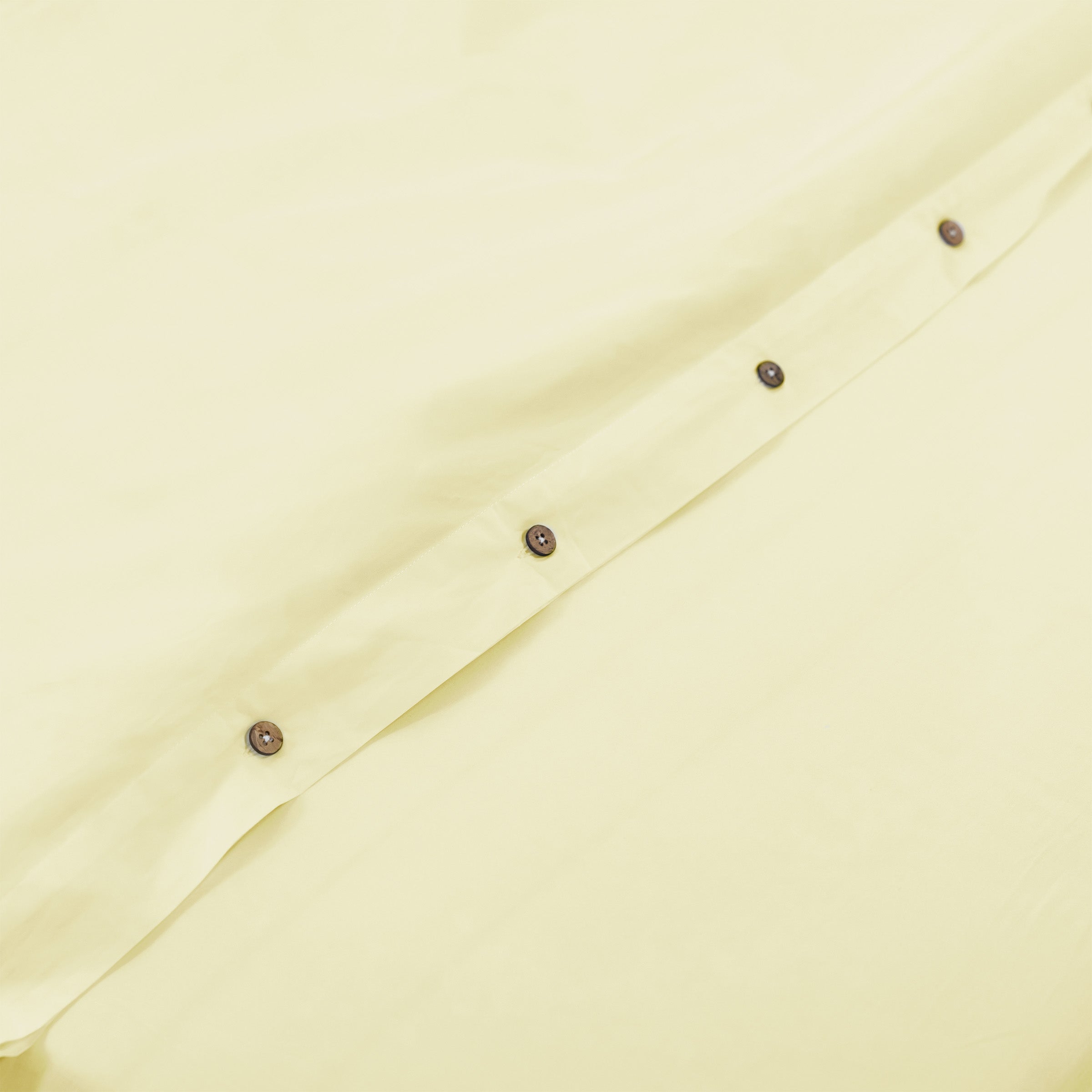 classic-butter-yellow-duvet-cover-coconut-buttons-by-sojao