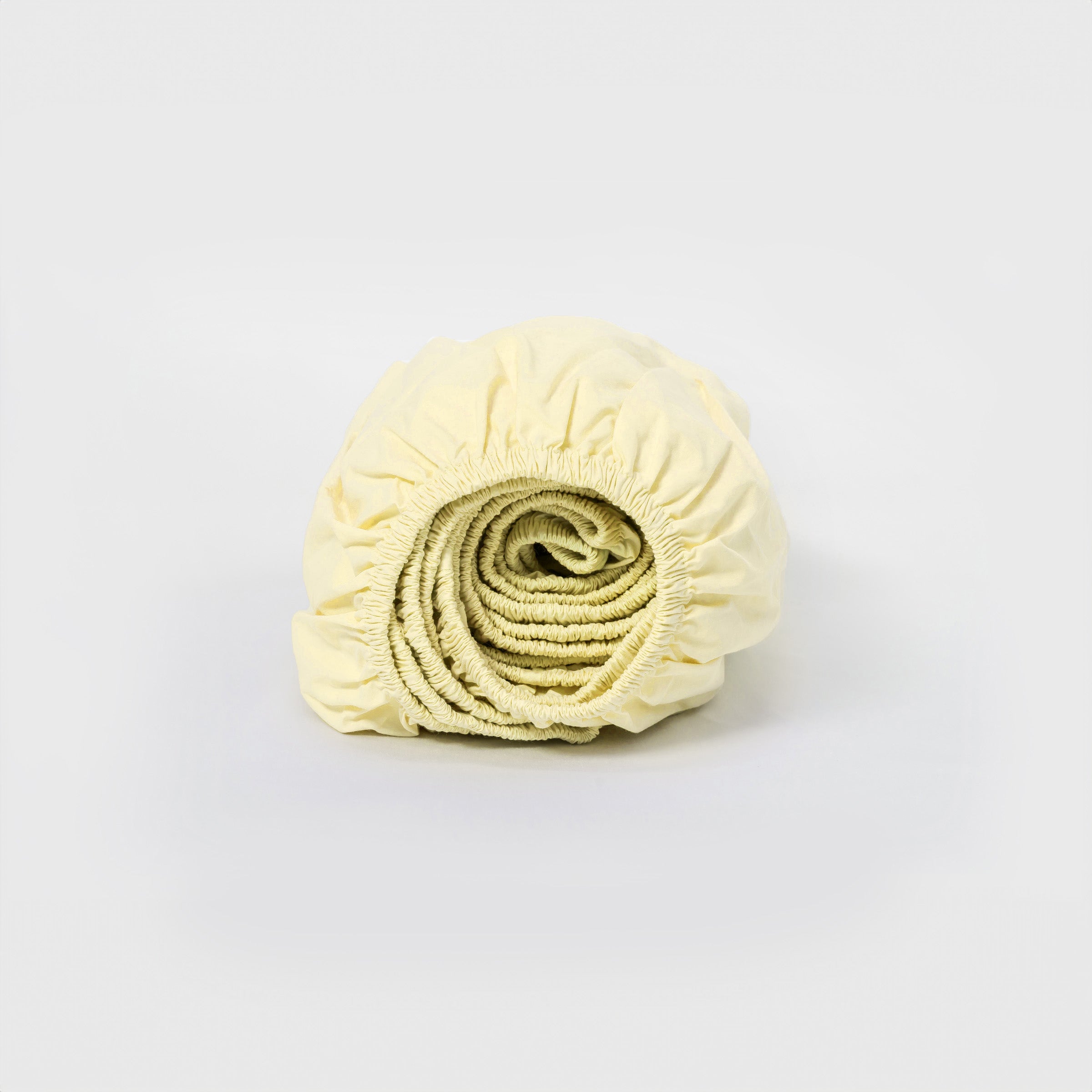 organic-classic-fitted-sheet-in-butter-colour-by-sojao