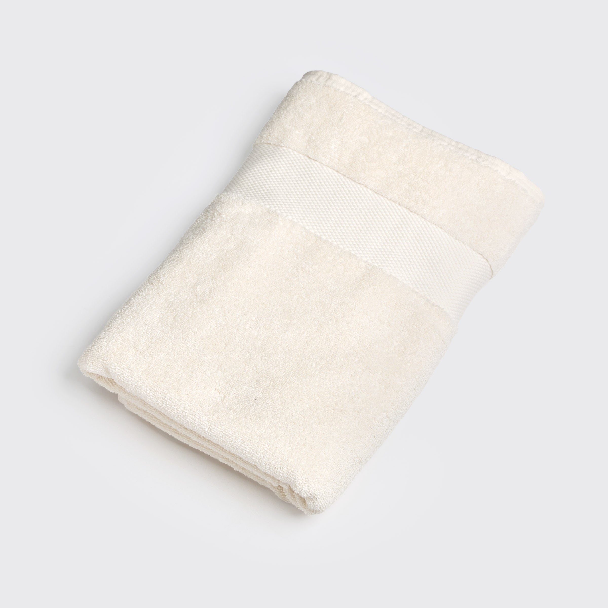 organic-cotton-hand-towel-in-natural-colour-folded-by-sojao