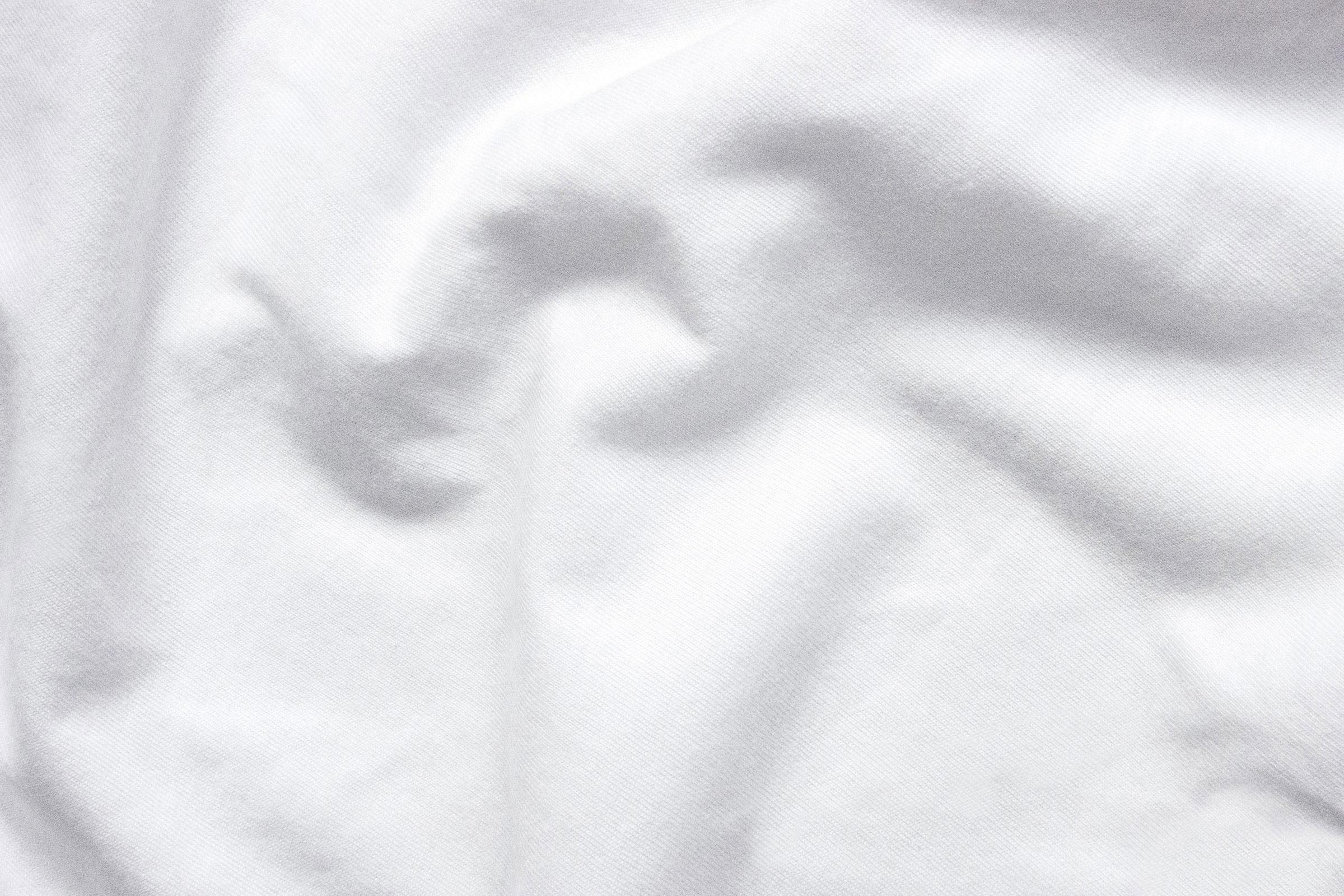 organic-jersey-white-baby-cot-fitted-sheet-close-up-shot-by-sojao.jpg