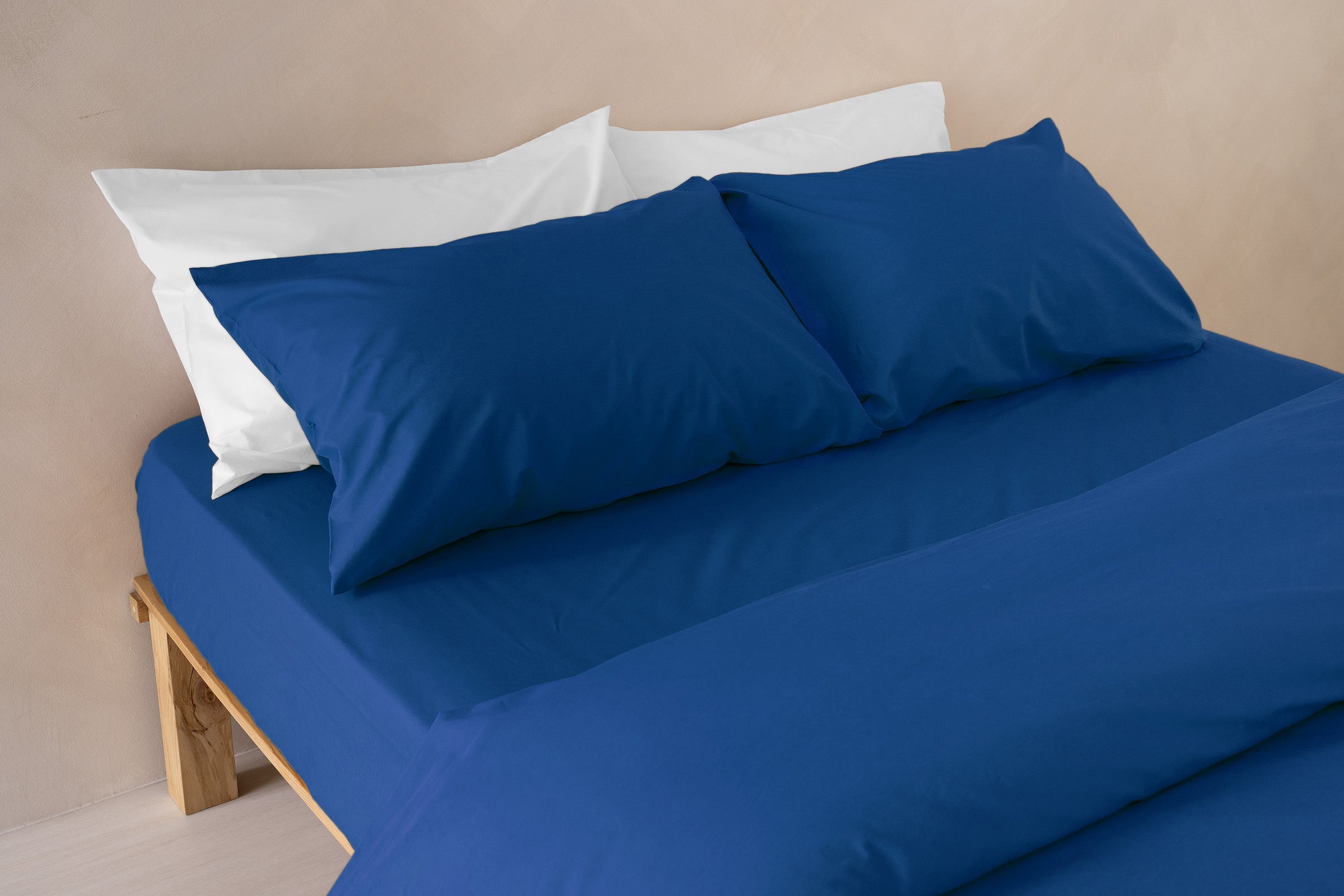 crisp-cobalt-duvet-cover-fitted-sheet-pillowcase-pair-white-pillowcase-pair-side-view-by-sojao.jpg