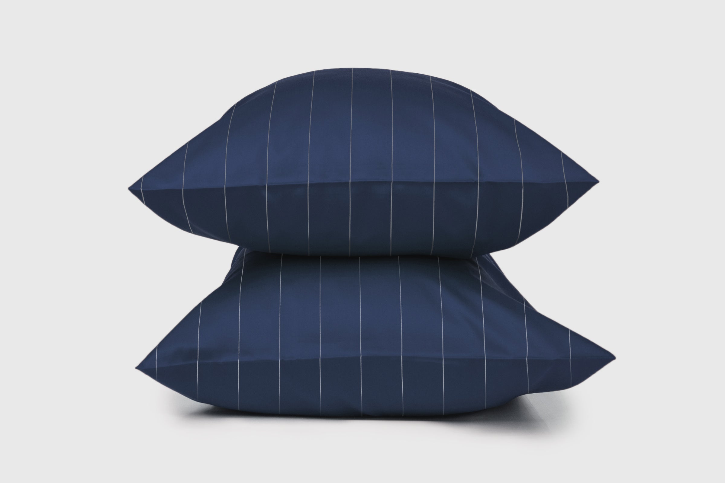 classic-navy-pinstripes-pillowcase-pair-product-shot-by-sojao.jpg