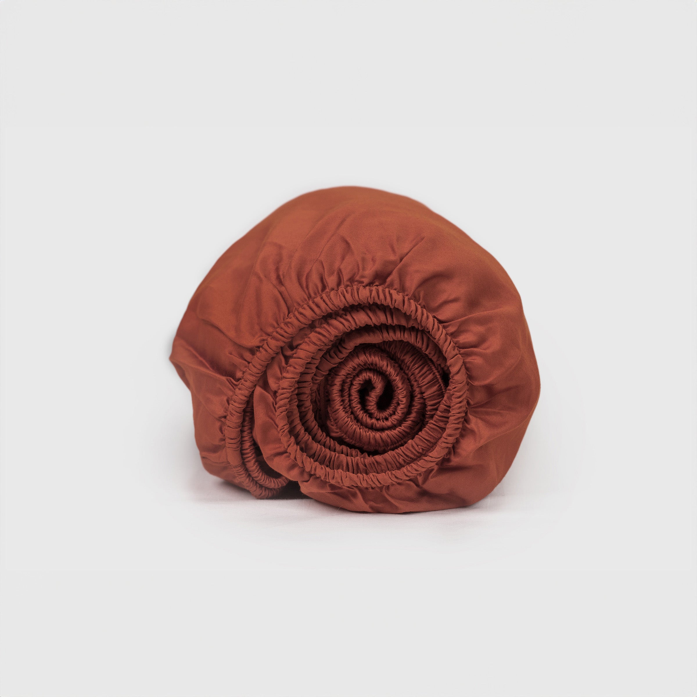 organic-crisp-fitted-sheet-in-clay-colour-by-sojao