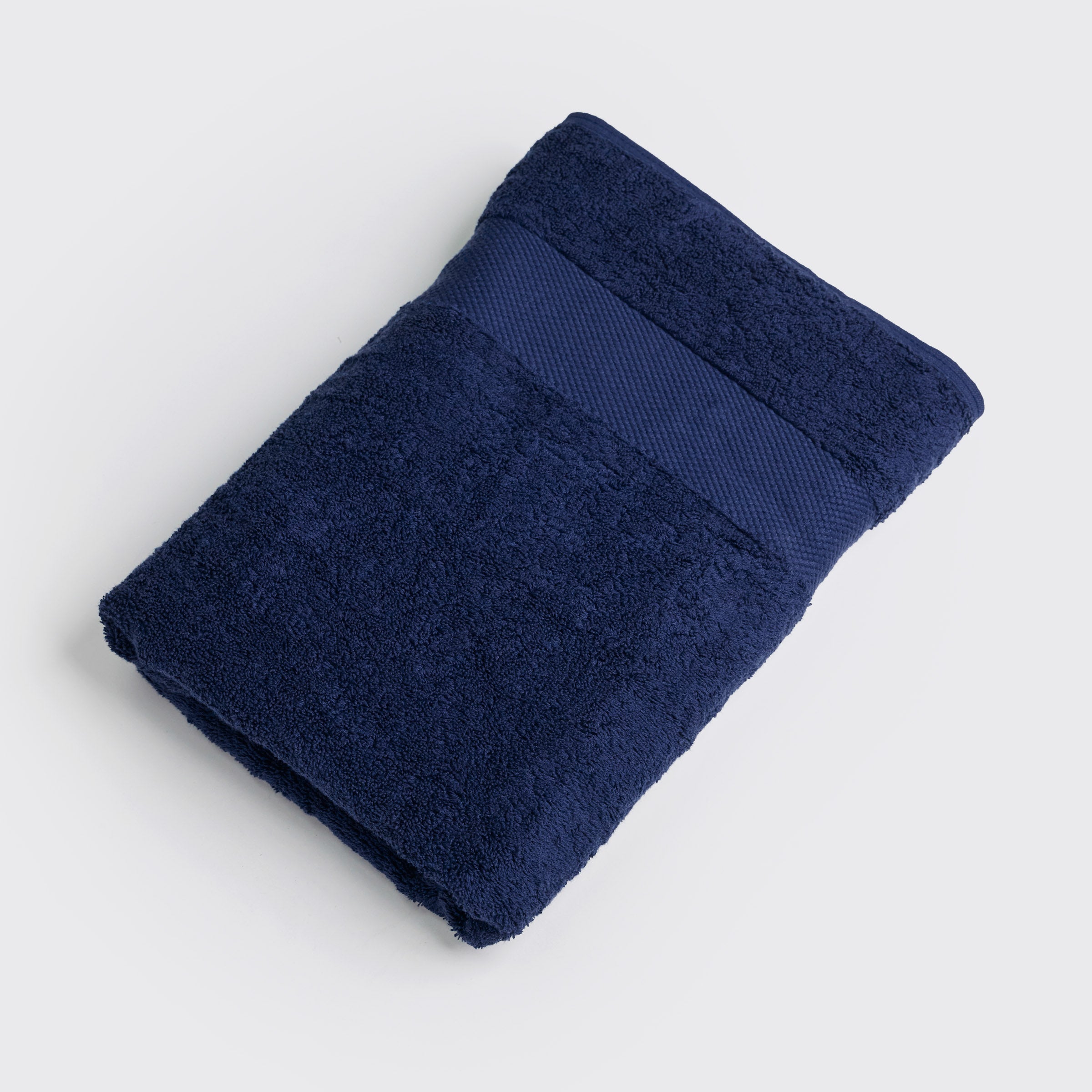 organic-cotton-bath-towel-in-navy-colour-folded-by-sojao