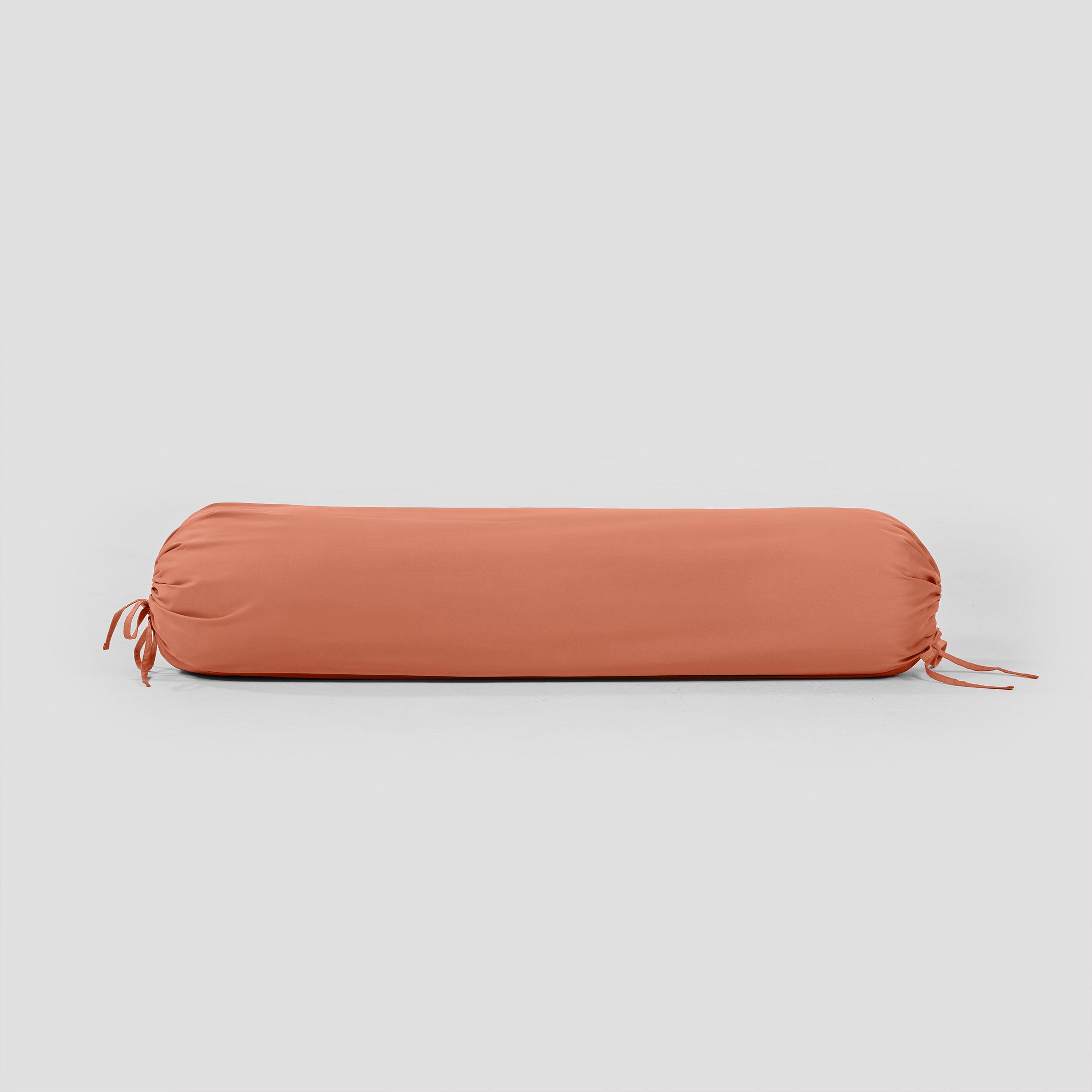 classic-bolster-case-in-peach-colour-by-sojao