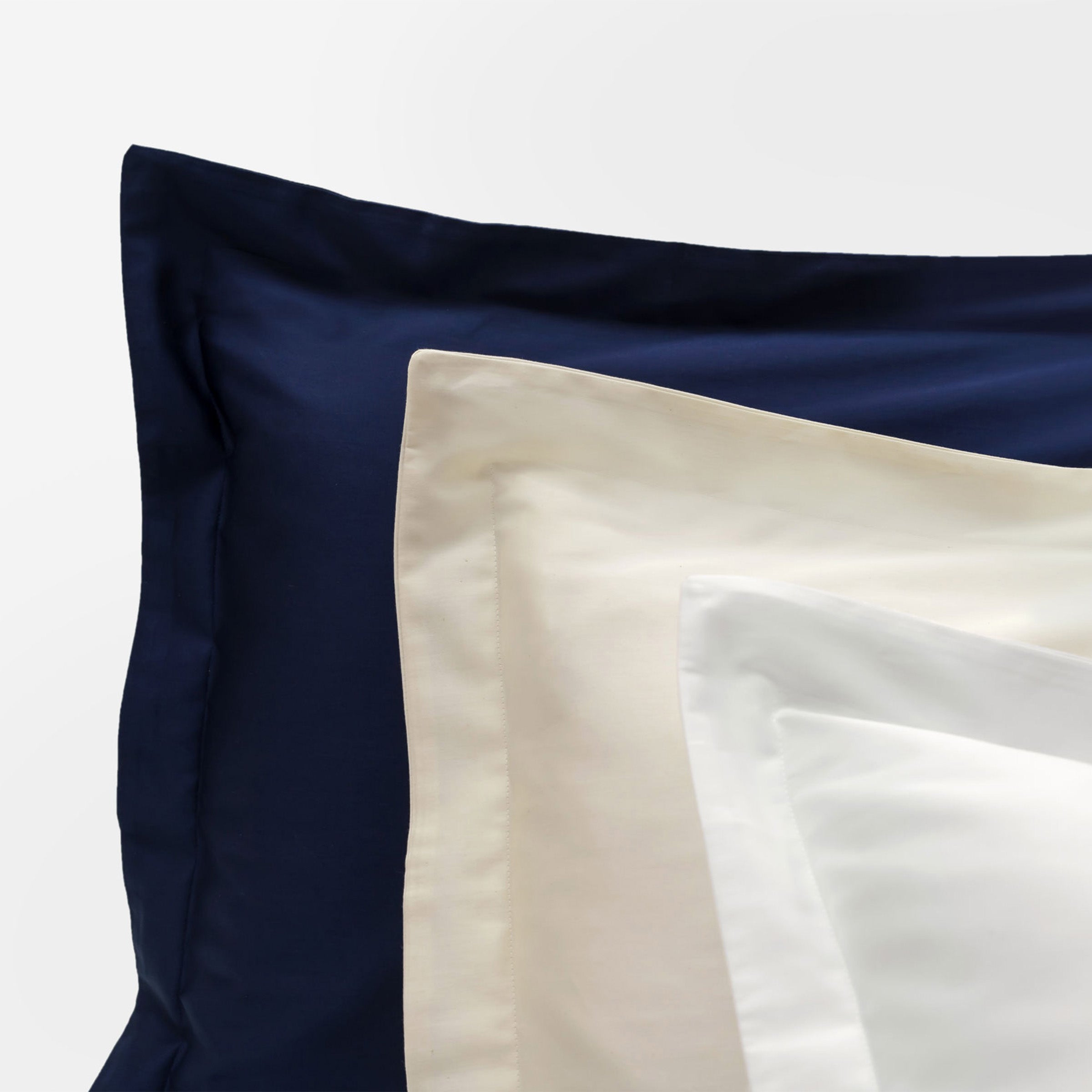 classic-navy-natural-white-oxford-pillowcase-pair-flange-border-by-sojao.jpg