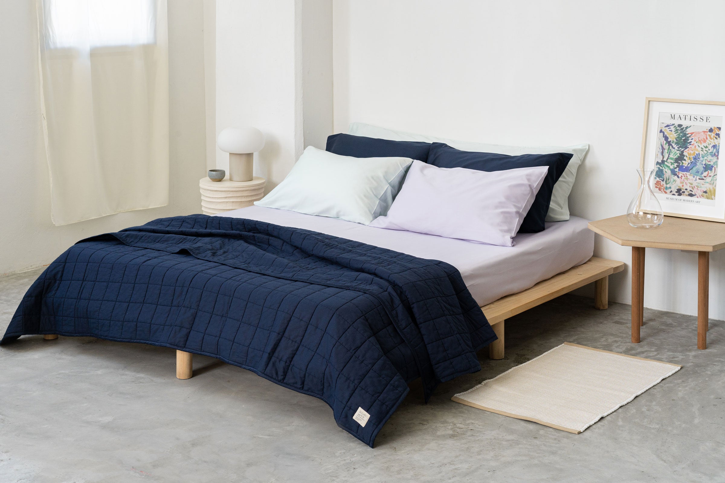 navy-organic-cotton-quilt-side-wide-shot-by-sojao.jpg