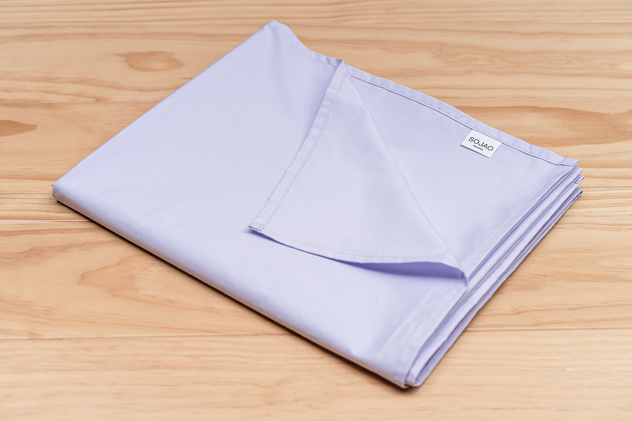 crisp-lilac-organic-cotton-table-cloth-folded-by-sojao.jpg