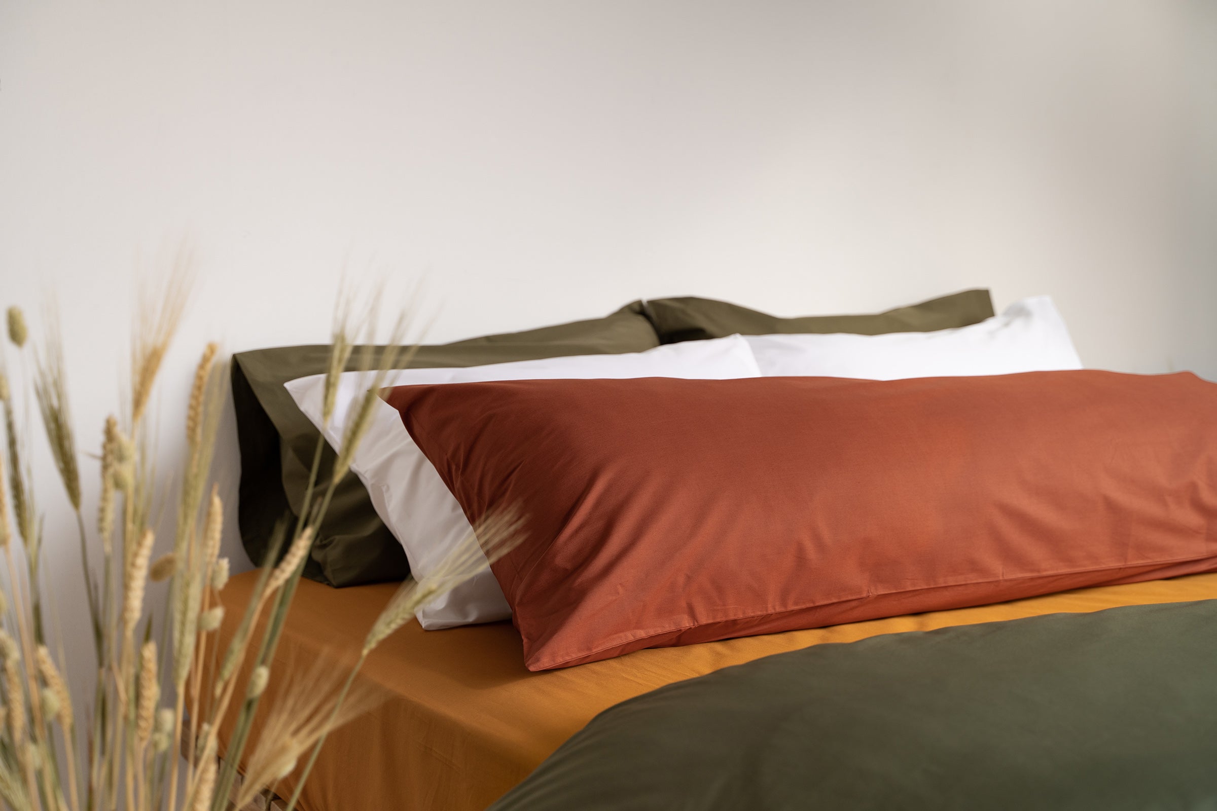 crisp-olive-white-clay-body-pillow-side-wide-shot-by-sojao.jpg